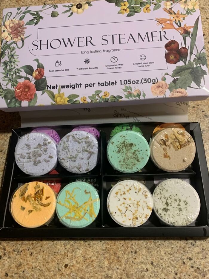 Shower steamer gift set with floral scents, ideal for antisocial people seeking a relaxing self-care experience.