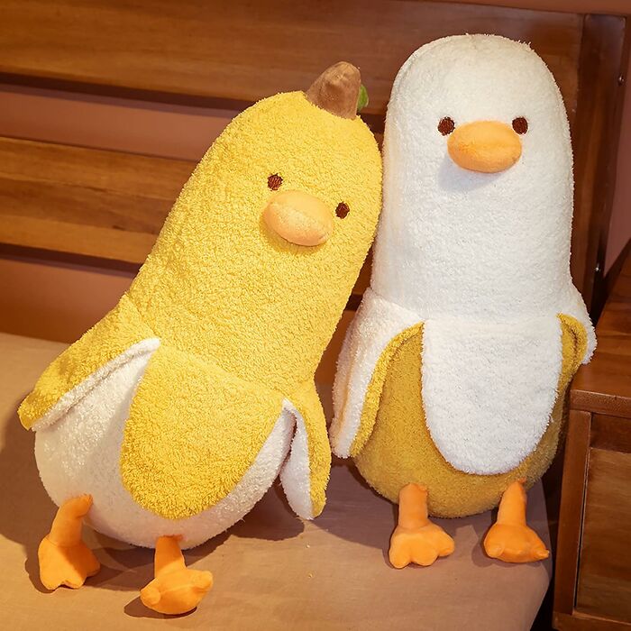 Two plush stuffed toys, one yellow and one white, perfect Christmas gifts available on Amazon Prime.