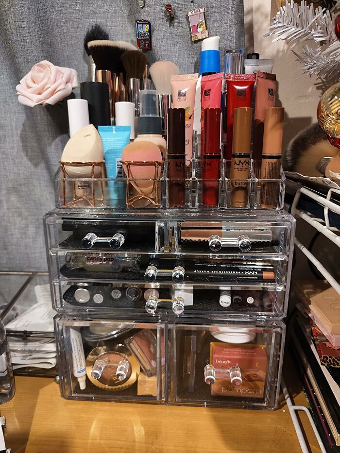 Makeup organizer with lipsticks, foundations, and brushes neatly arranged to change the way you organise your beauty products.