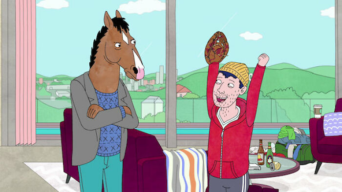 Animated characters in a living room, one with horse features and another celebrating with a beanie, showcasing fascinating fan theories.