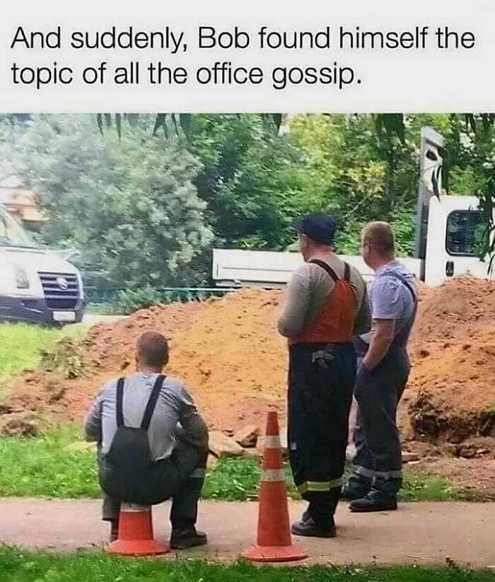 Three construction workers standing by cones with one sitting, embodying relatable workplace humor.