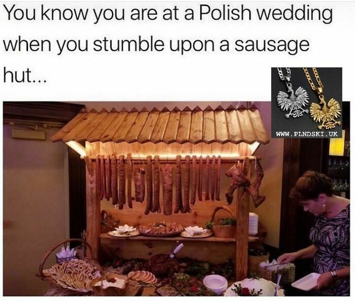 Polish memes: A wooden hut at a wedding with hanging sausages and a person nearby, showcasing traditional Polish food.