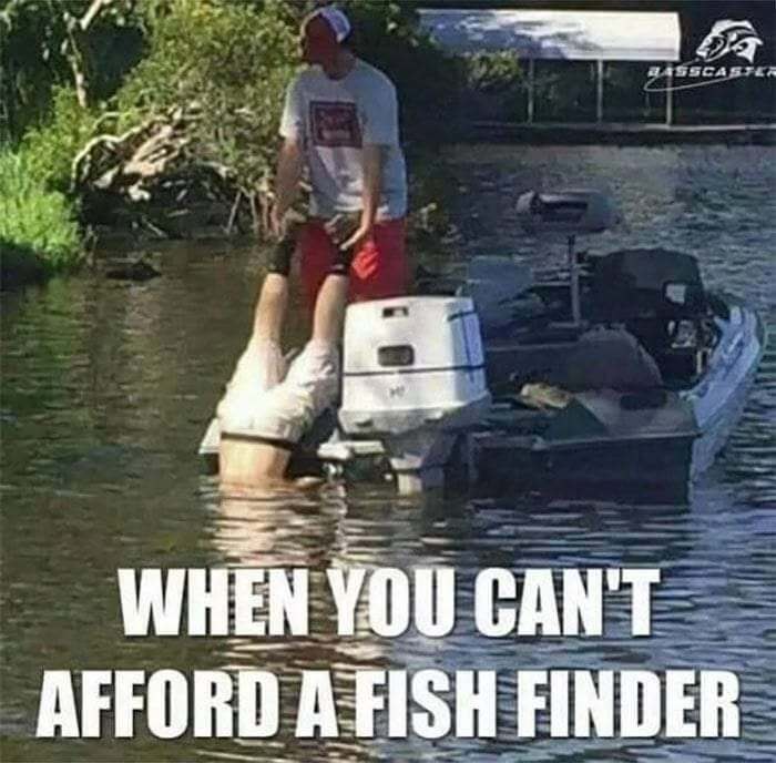 Two men on a boat, one holding the other's legs, humorously used instead of a fish finder.