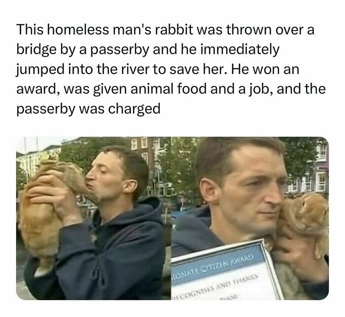 Man holding a rabbit, showcasing wholesome kindness after a rescue, with an award in hand.