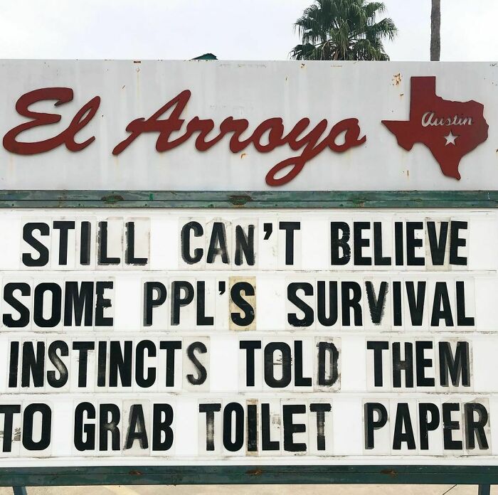 Funny El Arroyo sign about people's survival instincts and toilet paper in Austin, Texas.