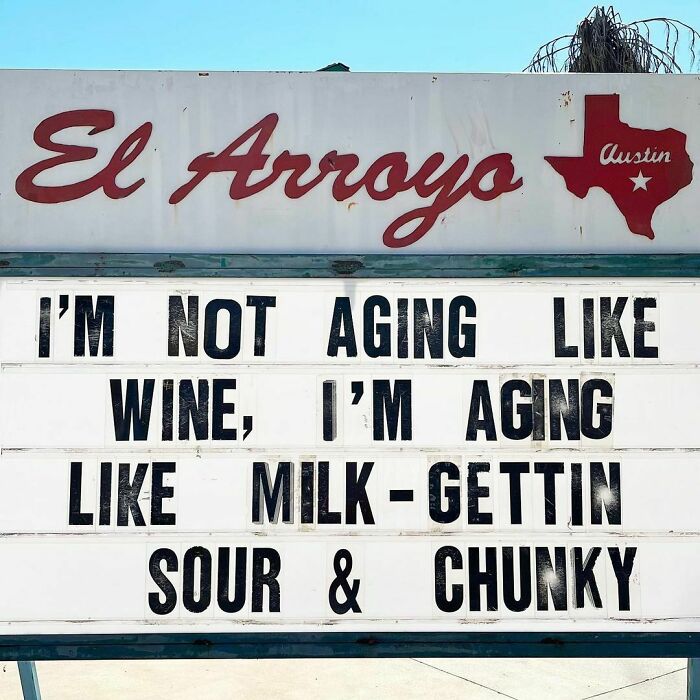 Humorous El Arroyo sign with a witty message about aging like milk, not wine.