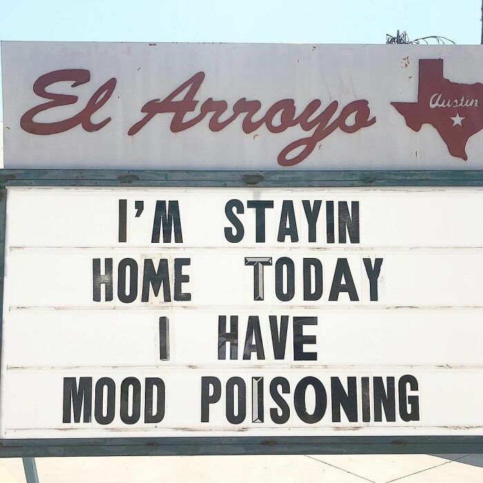 El Arroyo sign humorously states: "I'm stayin home today, I have mood poisoning."