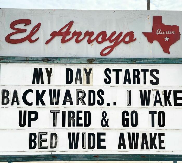 El Arroyo sign with humorous message: "My day starts backwards. I wake up tired & go to bed wide awake."