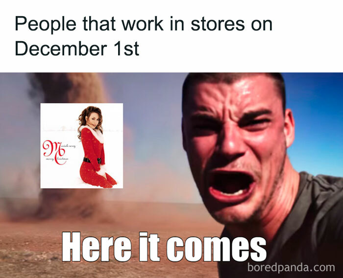 A person appearing alarmed, anticipating holiday chaos, with Mariah Carey's Christmas album cover in the background.