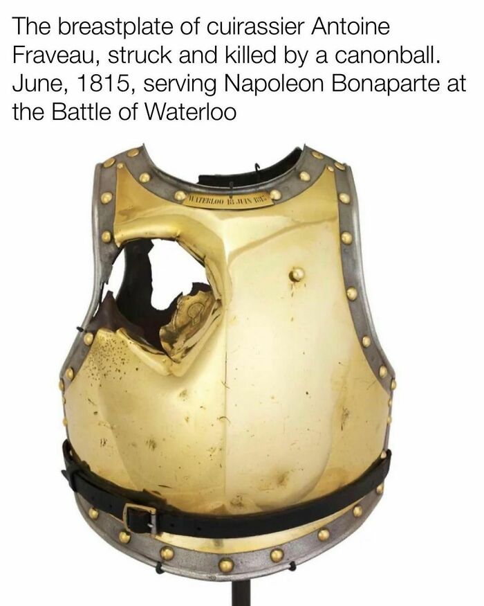 Damaged breastplate from Battle of Waterloo, hit by a cannonball, showcasing interesting history facts.