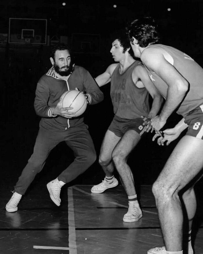 Historical picture of a basketball game, featuring players in motion on the court, emphasizing learn from the past themes.