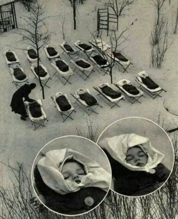 Historical image of babies sleeping outside in the snow on cots, related to Interesting-History-Pics-Facts.