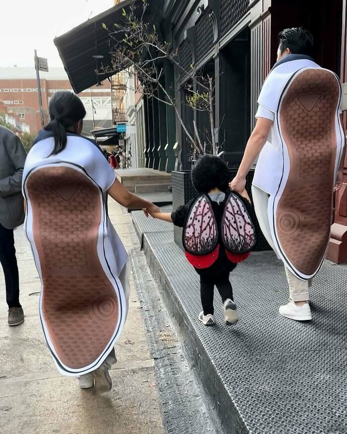 Family in humorous sneaker and bug costumes, walking down a New York street.