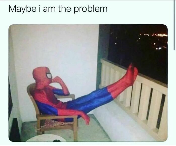 Spider-Man sitting on a balcony, pondering, with text "Maybe I am the problem," illustrating a relatable mental health meme.