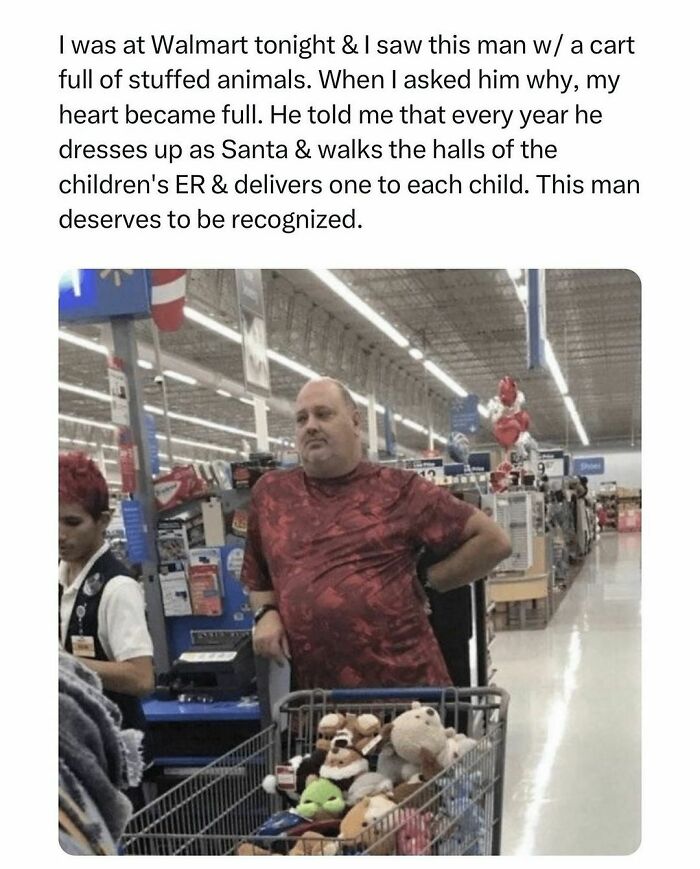 Man in a store with a cart full of stuffed animals, showcasing wholesome-kindness, preparing gifts for children's hospital visit.