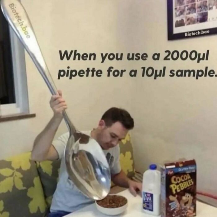 Man using oversized spoon for cereal, showcasing a science meme humorously exaggerating lab equipment use.