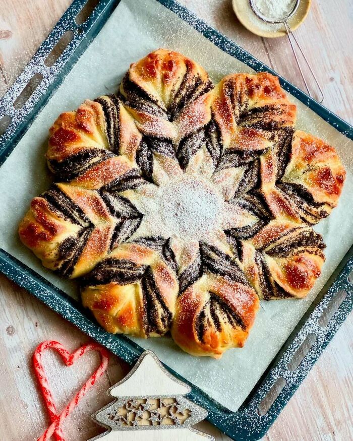 Festive star-shaped pastry dusted with powdered sugar, perfect for Christmas snack food ideas.