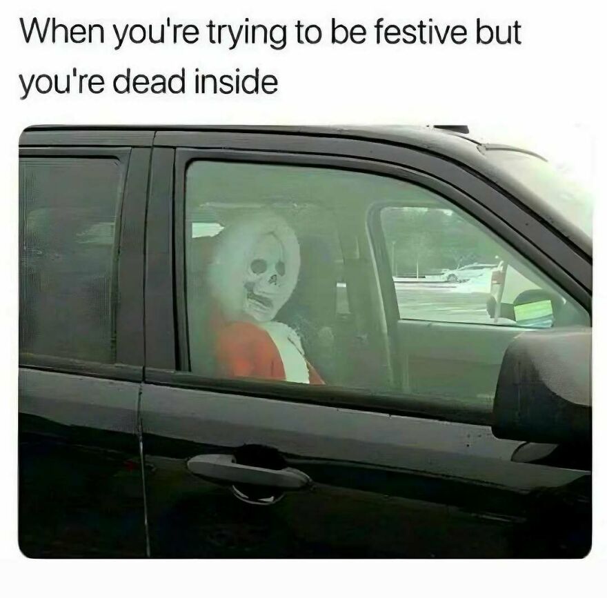 A skeleton dressed as Santa sitting in a car, capturing the essence of funny Christmas memes.