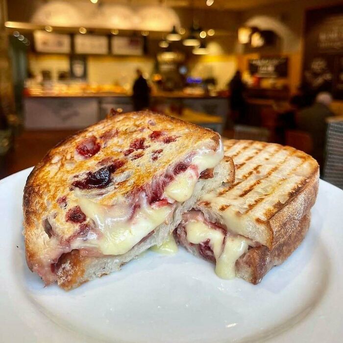 Grilled cheese sandwich with cranberry, a festive Christmas snack idea.