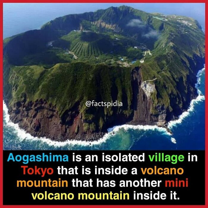 Aerial view of Aogashima, a village inside a volcano in Tokyo, featuring lush greenery and rugged cliffs.