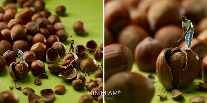 Miniature figures playing golf on hazelnuts, showcasing tiny worlds of foods and creative artistry.