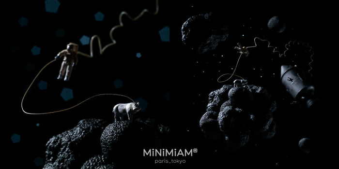 Miniature astronaut and cow on truffle planets in space, creative duo artwork.