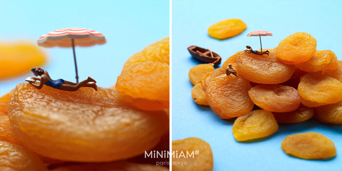 Miniatures of a tiny sunbather on dried apricots under an umbrella, part of a creative duo's food art.