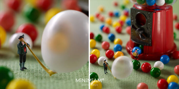 Miniature figures with gumball machine and candy, showcasing tiny world of foods and things.