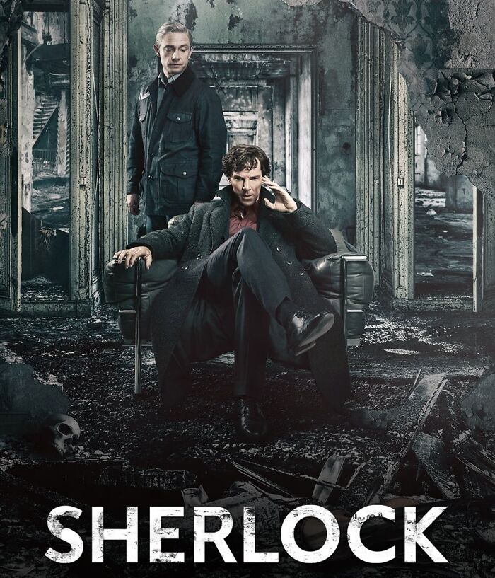 Two characters in a dark, dilapidated room, seated and standing, in a promo image for the TV show "Sherlock."