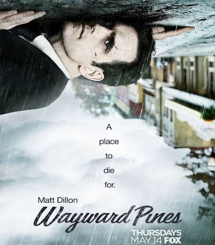 Promotional poster for "Wayward Pines" featuring a man's reflection on a wet street. Keywords: Canceled TV Shows.