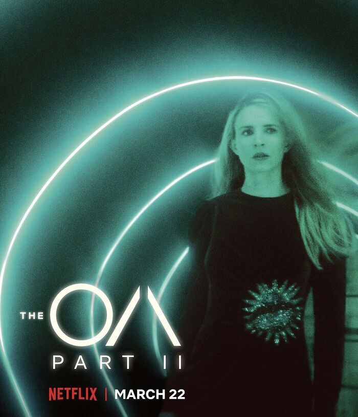 Poster for "The OA Part II" featuring a mysterious woman under glowing light, hinting at TV show reboot possibilities.