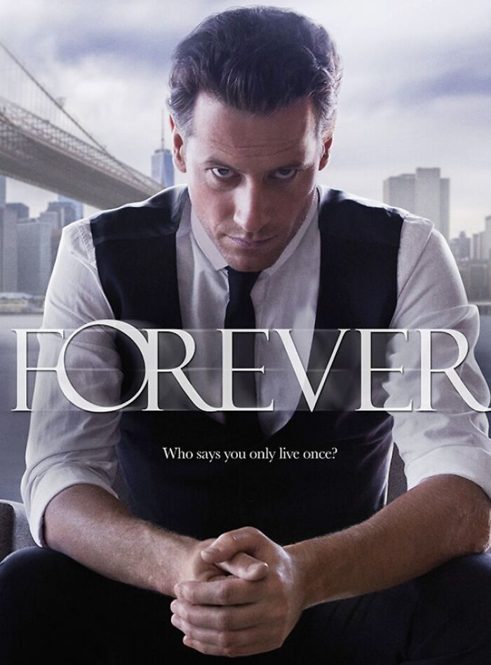 TV show poster for "Forever" featuring a serious-looking man seated, backdrop of a city skyline, discussing canceled shows.