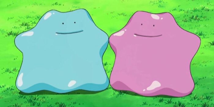 Two cute, colorful creatures smiling in a grassy field, related to fascinating fan theories.