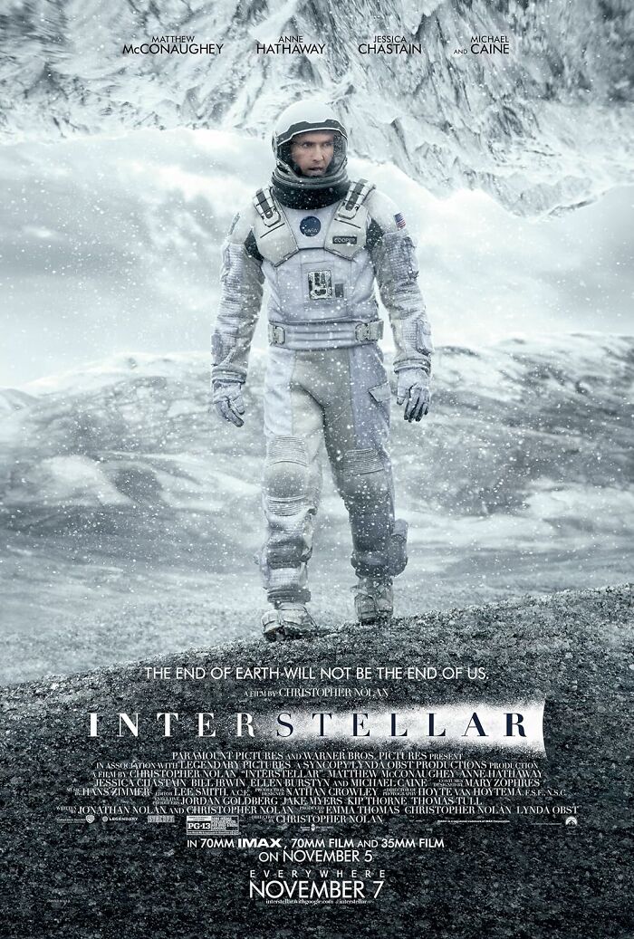 Astronaut on icy terrain in the movie poster for Interstellar, one of IMDb's top cinematic masterpieces.