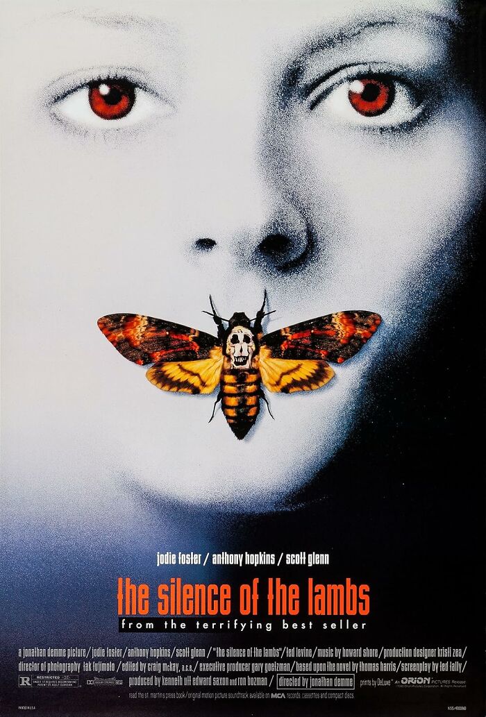 Poster of "The Silence of the Lambs" featuring a close-up of a face with a moth over the mouth.