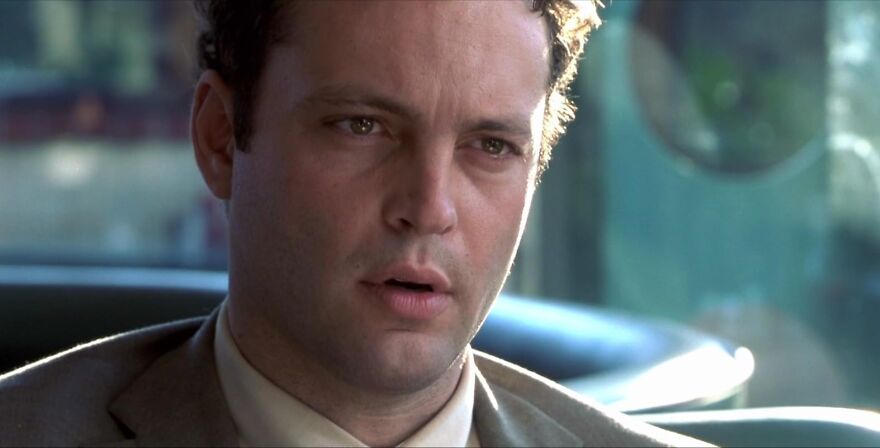 Actor Vince Vaughn in a suit with a serious expression, exemplifying a common on-screen persona.