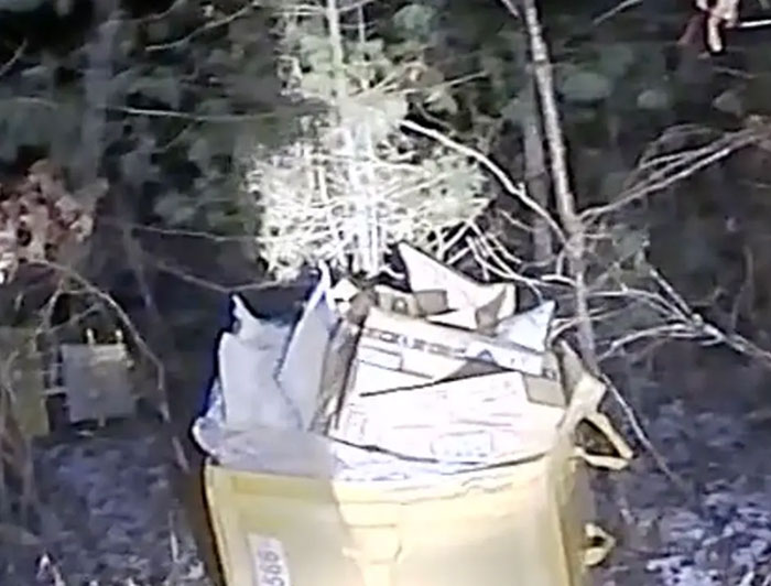 Police Discover Dozens Of Packages Left In The Woods By Delivery Driver Days Before Christmas 