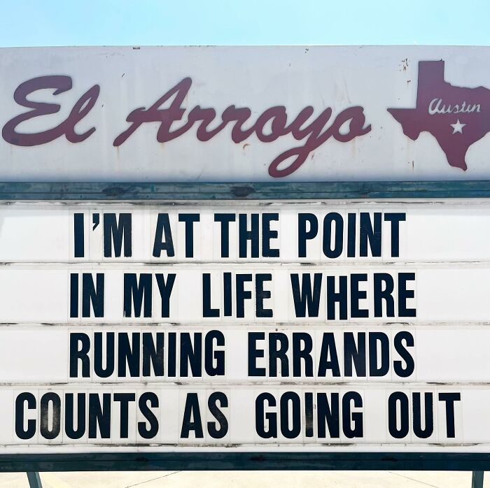 El Arroyo sign with humorous quote about errands counting as going out.