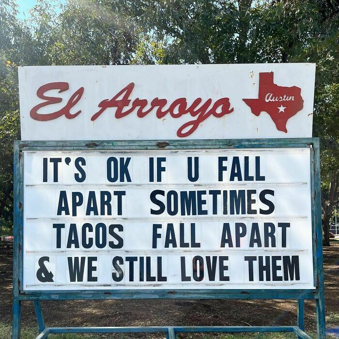 El Arroyo sign with humorous message about falling apart and tacos.