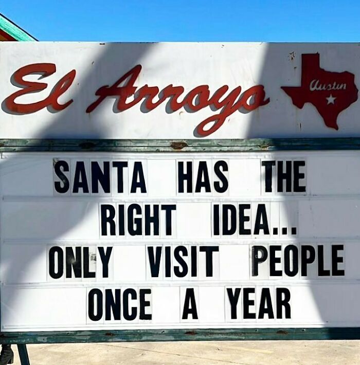 El Arroyo sign with humorous message about Santa visiting once a year.