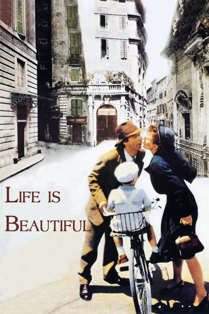 "Life is Beautiful film poster, featuring a family with a bike on an Italian street."