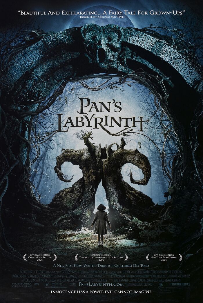 Pan's Labyrinth movie poster showing a girl facing a fantastical tree creature in a dark forest setting.