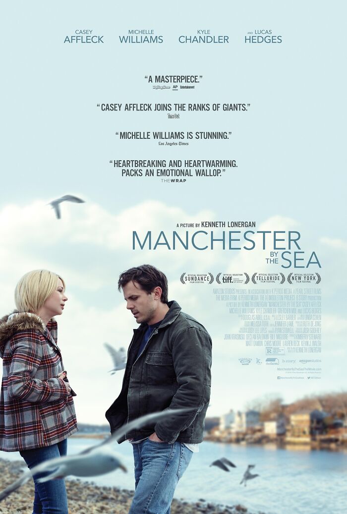 "Manchester by the Sea poster with leading actors by a coastal setting."