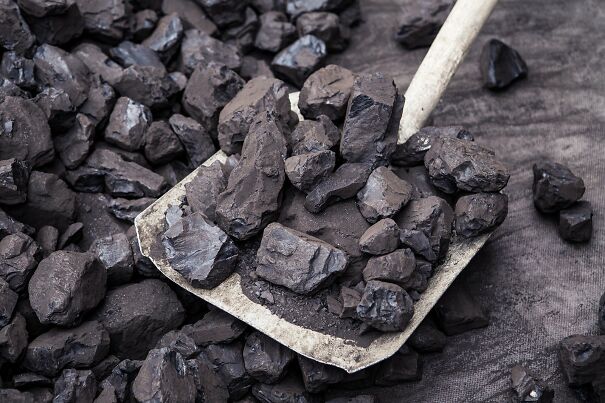 bigstock-Shovel-And-Coal-In-The-Backgro-104167850.jpg