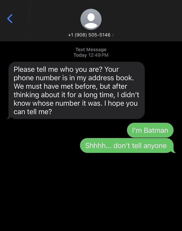 Screenshot of a humorous scam text response claiming to be Batman.