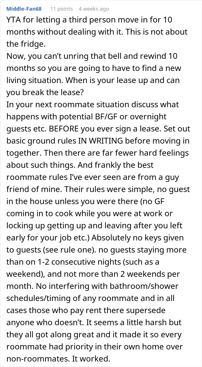 User comments on awkward living situation with girlfriend moving in, urging to find new living arrangements.