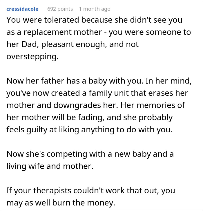 Reddit comment discussing stepdaughter's hostile behavior towards new family dynamics with a baby.