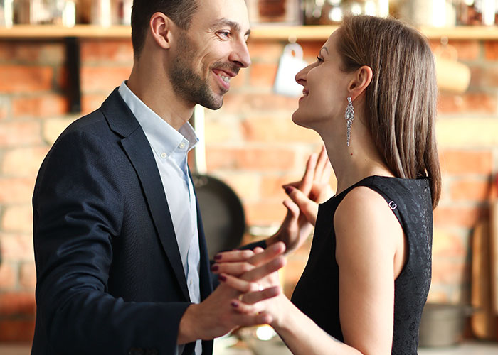 A couple in formal attire sharing a moment, representing a cheating story scenario.