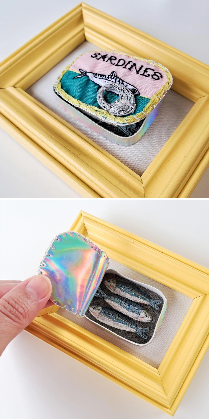 Framed creative embroidery of sardines with a metallic lid, showcasing intricate artistic detail.