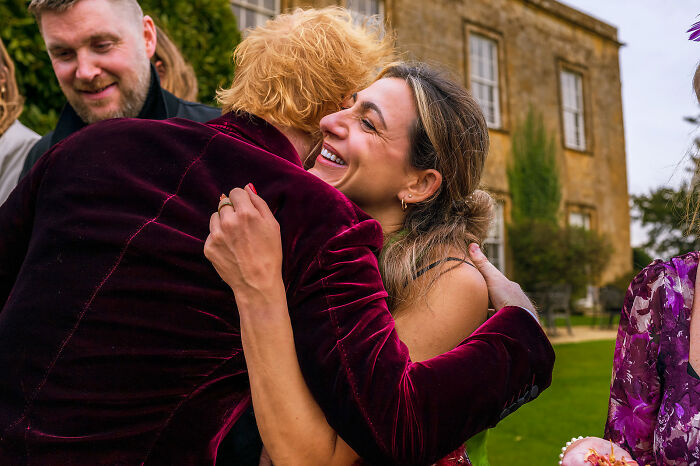 Ed Sheeran Hugging A Guest